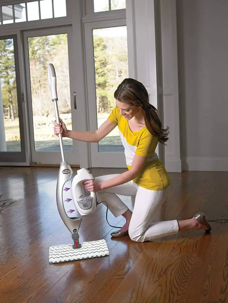 lady using shark lift-away pro steam pocket mop