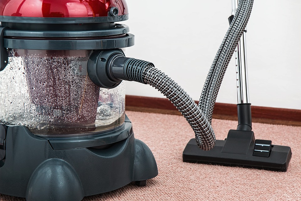 vacuum cleaner in a carpet